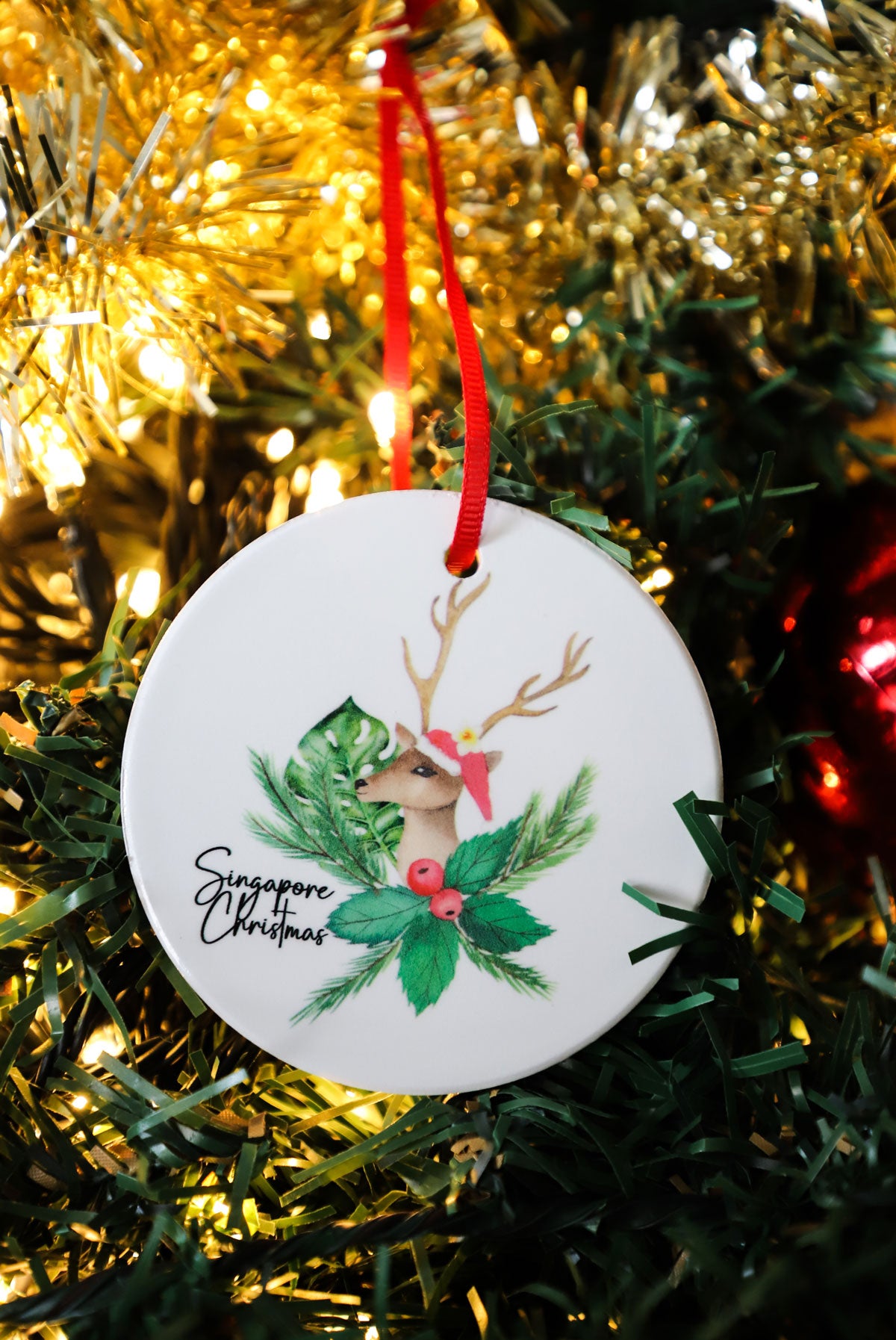 Reindeer in Tropical Foliage Christmas Ornament